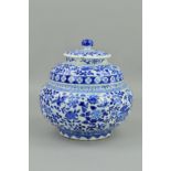 A CHINESE BLUE AND WHITE PORCELAIN JAR AND COVER, of double shouldered form, the circular cover with