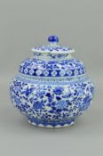 A CHINESE BLUE AND WHITE PORCELAIN JAR AND COVER, of double shouldered form, the circular cover with