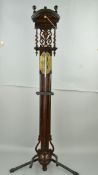 A 19TH CENTURY FLEMISH OAK AND WALNUT STAINED STICK BAROMETER, the arched top with two ball