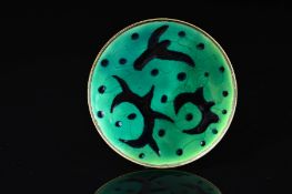 A NORWEGIAN ENAMEL BROOCH BY OYSTEIN BALLE, of circular outline with black enamel pointed and curved