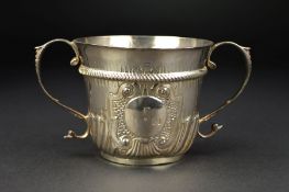 A QUEEN ANNE BRITANNIA STANDARD SILVER PORRINGER BY SETH LOFTHOUSE, cast 'S' scroll handles, central