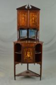 A LATE VICTORIAN ROSEWOOD AND INLAID FLOORSTANDING CORNER CUPBOARD, the architectural pediment