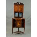 A LATE VICTORIAN ROSEWOOD AND INLAID FLOORSTANDING CORNER CUPBOARD, the architectural pediment