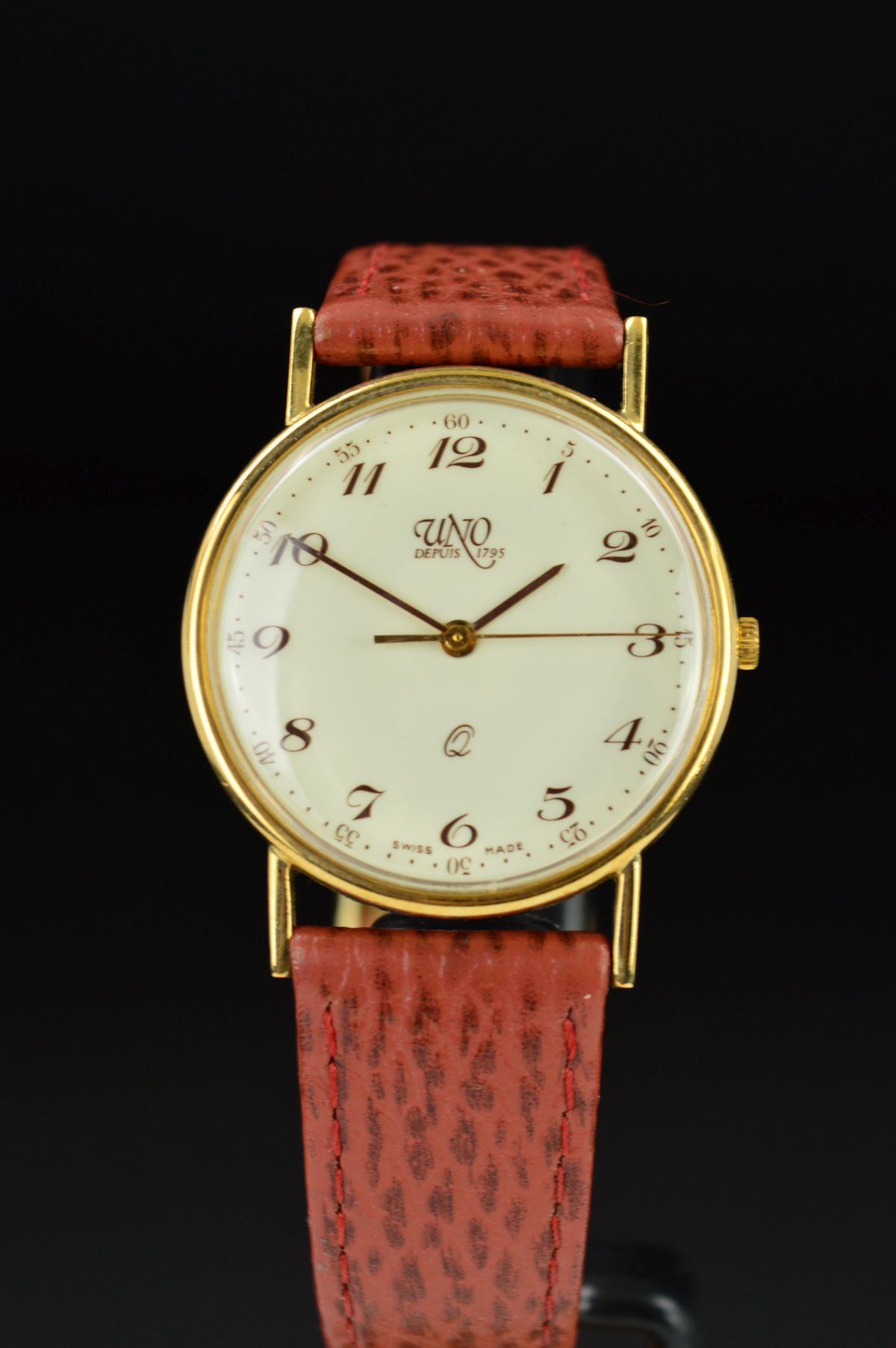 A MID TO LATE 20TH CENTURY 9CT GOLD GENT'S UNO WRISTWATCH, cream dial with Arabic numerals, Quartz