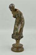 AFTER LEON PILET, a bronze figure of a windswept girl (Gust of Wind or Coup de Vent) on a circular