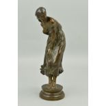 AFTER LEON PILET, a bronze figure of a windswept girl (Gust of Wind or Coup de Vent) on a circular