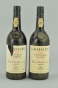 TWO BOTTLES OF GRAHAM'S 1977 VINTAGE PORT, seals intact, a classic Port