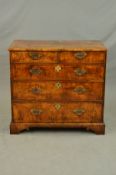 A GEORGE II STYLE WALNUT AND STAINED PINE CHEST OF TWO SHORT AND THREE LONG GRADUATED DRAWERS,