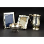 A GEORGE VI SILVER BALUSTER SHAPED TANKARD, cast 'S' scroll handle, stepped circular base with