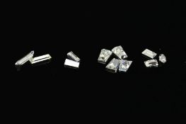 VARI-CUT DIAMONDS, four tapered baguette cut, approximate total weight 0.33ct, colour assessed as