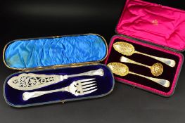 A LATE VICTORIAN CASED PAIR OF SILVER FISH SERVERS, Kings pattern, foliate engraved and pierced