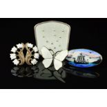 FOUR DESIGNER NORWEGIAN ENAMEL BROOCHES, to include a white enamel floral brooch by Monster