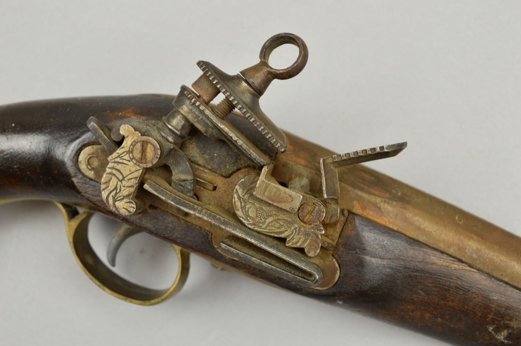 A 25 BORE ANTIQUE MIQUELET MILITARY DESIGN SPANISH MANUFACTURED SINGLE BARREL PISTOL, the top of the - Image 2 of 5