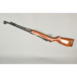 A .22'' 'SMK' MODEL B3-F AIR RIFLE, serial number Y413733, it has an under lever action, it is in