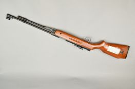 A .22'' 'SMK' MODEL B3-F AIR RIFLE, serial number Y413733, it has an under lever action, it is in