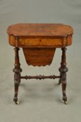 A VICTORIAN WALNUT AND BURR WALNUT WORK TABLE, of shaped oval outline, fitted with a drawer with