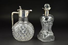 A LATE VICTORIAN SILVER MOUNTED CUT GLASS CLARET JUG, of bulbous form, makers W & C Sissons,