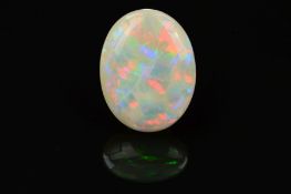 A LARGE OVAL SHALLOW CABOCHON CUT OPAL STONE, measuring 28mm x 21.8mm, weighing 26.87ct, grey base