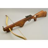 A FULL SIZE CROSSBOW, by Border Bows, Kelso, Scotland, fitted with a thumb hole stock