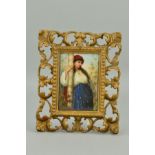A LATE 19TH CENTURY CONTINENTAL PORCELAIN PLAQUE, possibly KPM, painted with a gypsy girl leaning