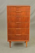 AN AUSTIN SUITE TALL TEAK CHEST OF SIX DRAWERS, on square tapering legs, width 65cm x depth 41cm x