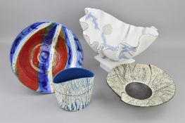 FOUR PIECES OF STUDIO POTTERY, two pieces are by Louise Darby, a compressed cylinder vase in blue