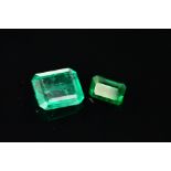 TWO EMERALDS, to include one emerald cut, measuring 9.2mm x 7.93mm, weighing 2.12ct, please note