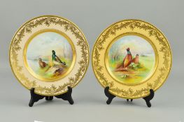 A NEAR PAIR OF SECOND HALF OF THE 20TH CENTURY MINTON CABINET PLATES, one handpainted with male