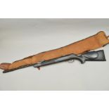 A .177'' TURKISH MODEL KRAL MAGNUM AIR RIFLE, serial No.49755, together with a canvas slip, it is in