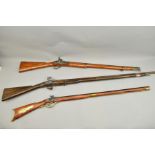 A REPRODUCTION POOR QUALITY FLINTLOCK MUSKET, a poor quality percussion copy of a Kentucky rifle and