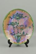 DARTINGTON POTTERY, a large oval charger designed by Claire Woodall, decorated in the Fennell