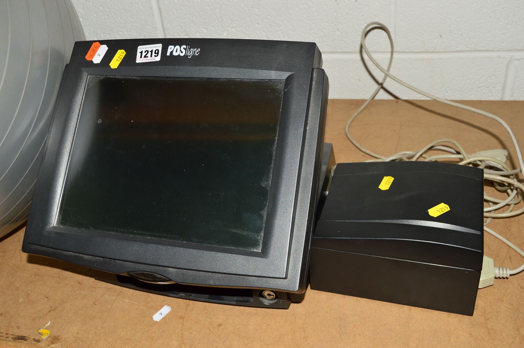 A POSLIGNE POINT OF SALE TERMINAL, with a lable printer