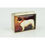 A PILL BOX of rectangular outline with a transfer print of a French bulldog to the front panel,