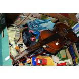 A BOX OF TOYS, SUNDRIES ETC, to include a distressed violin (no strings and scratched) and bow,