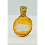 A SMALL GLASS SCENT BOTTLE WITH ORIGINAL STOPPER, carved to the front with the image of a building ,