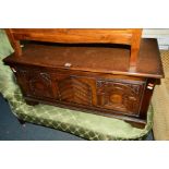 A CARVED OAK BLANKET CHEST