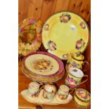 A GROUP OF FRUIT DECORATED PLATES, CRUET, MUG, MUG, JUG ETC, to include Claytondale china, Radnor