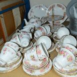 A DUCHESS TEASET, 'June Bouquet' pattern, to include teapot, cake plate, milk jug, sugar bowl, six