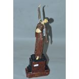 AN ART DECO STYLE FIGURE, mounted on marble base, height approximately 39.5cm (one hand loose and