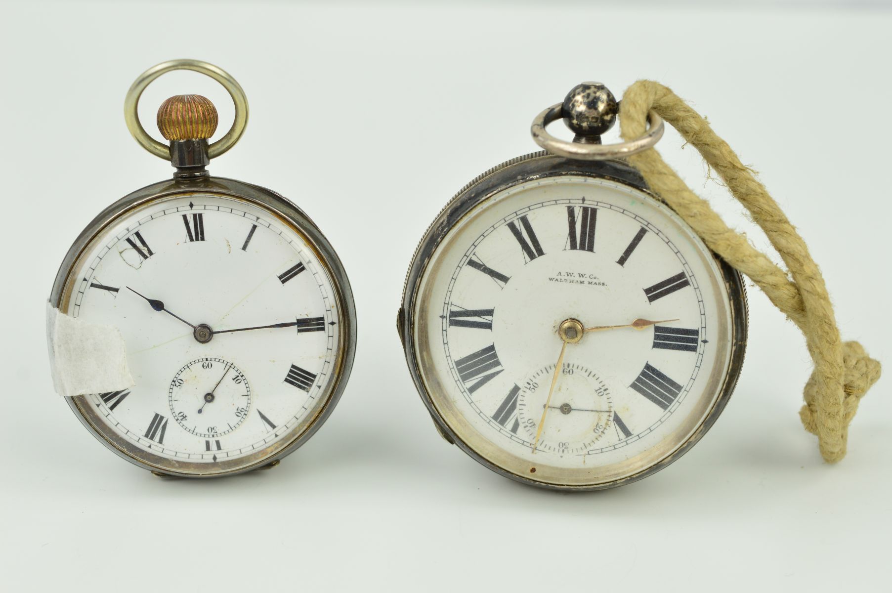 TWO EARLY 20TH CENTURY SILVER POCKET WATCHES, both open face pocket watches with white dials,