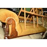 AN EDWARDIAN OAK CHAISE LONGUE