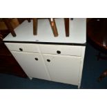A PAINTED KITCHEN CABINET with an enamel top, two drawers and double cupboard doors