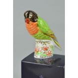 A BOXED LIMITED EDITION ROYAL CROWN DERBY PAPERWEIGHT, 'Black Faced Love Bird', No 11/2500, gold