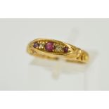 AN EDWARDIAN 18CT GOLD RUBY AND DIAMOND RING, designed as three graduated circular rubies
