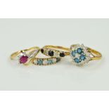 FOUR 9CT GOLD GEM SET RINGS, the first a sapphire and diamond ring, designed as three graduated