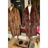 A LADIES FUR COAT, approx size 14/16, repair to the collar, together with a faux fur coat, a knitted