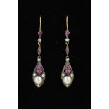 A PAIR OF RUBY, DIAMOND AND CULTURED PEARL DROP EARRINGS, each designed as a pear shape panel set