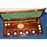 A CASED DAVENPORT AND SULLIVAN GOLF CLASS PRO-AM 1998, 'Improve Your Putting', complete with target,