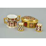 A MINIATURE ROYAL CROWN DERBY IMARI LOVING CUP, '1128' pattern (seconds), an Old Imari '1128' gold