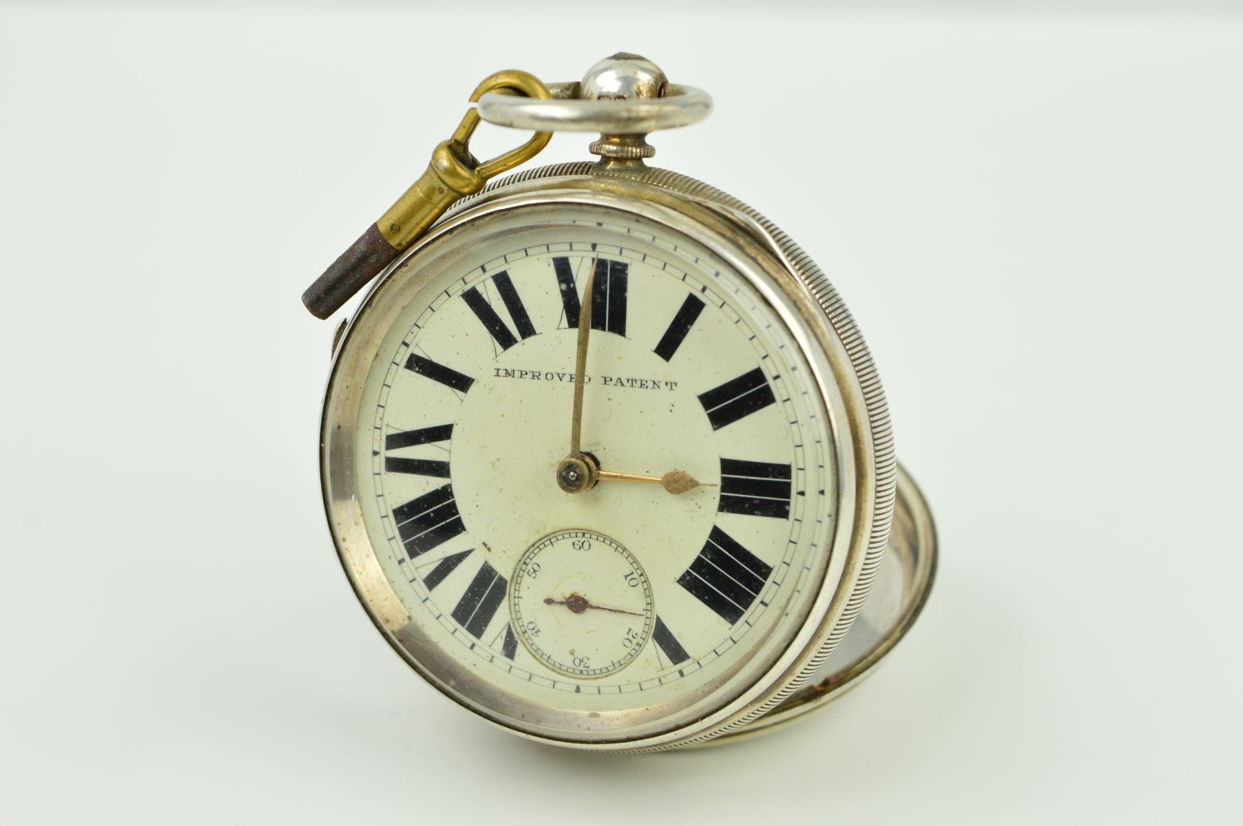 A LATE VICTORIAN SILVER POCKET WATCH, the open face pocket watch with white dial, Roman numeral